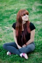 Rebellious teenager girl with red hair Royalty Free Stock Photo