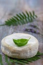 Reblochon. French cheese made in the Alpine region of Savoy from raw cow s milk. with dry grapes