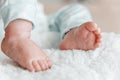 Reborn doll boy. small legs close up. Royalty Free Stock Photo