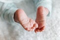 Reborn doll boy. small legs close up. Royalty Free Stock Photo