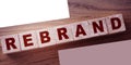 Rebrsnd Word on Wooden Cubes. Branding redesign rebranding marketing business concept Royalty Free Stock Photo