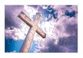 Rebuild our faith or losing faith - Christian cross against a cloudy sky - concept image in jigsaw puzzle shape