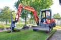 Rebuilding a house and digging dirt with excavator