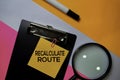 Recalculate Route text on sticky notes with color office desk concept
