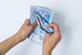 Recalculation of money hands national currency of Kazakhstan tenge