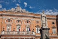 Recanati, Marche, Italy: the statue of the poet Giacomo Leopardi and the town hall Royalty Free Stock Photo