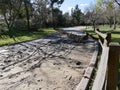 Receding flood water leave behind mud and debris