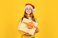 Receiving presents. Child picking gifts for family. Small cute girl preparing holiday gifts. Kid little cheerful girl