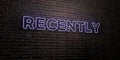 RECENTLY -Realistic Neon Sign on Brick Wall background - 3D rendered royalty free stock image