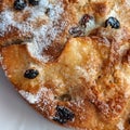 Homemade apple, raisin and cranberry pie, on a white plate