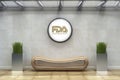 Reception Area of Pharma company showing on wall FDA Registered Facility. Golden color