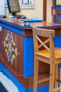 Reception check in desk with bell, computer and chair at hotel check in desk, selective focus Royalty Free Stock Photo