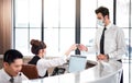 Businessman Check in at Hotel Reception