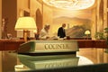 Reception_desk_in_small_hotel_1695522928508_1 Royalty Free Stock Photo