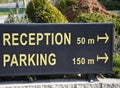 Reception and parking sign