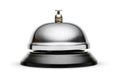 Reception or service bell with a shiny metal surface and a black plastic base. Isolated on white Royalty Free Stock Photo