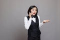 Receptionist answering smartphone call Royalty Free Stock Photo