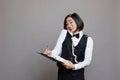 Receptionist chatting on landline phone Royalty Free Stock Photo