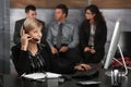 Receptionist talking on phone Royalty Free Stock Photo