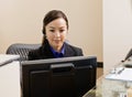 Receptionist with telephone earpiece Royalty Free Stock Photo