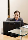 Receptionist with telephone earpiece