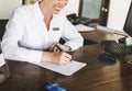 Receptionist working at the front desk Royalty Free Stock Photo