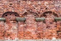 Recess arch frame in old brick wall.