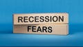 Recession fears symbol. Concept words Recession fears on wooden blocks.