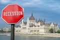 Recession stop sign with view of parliament in Budapest, Hungary. Financial crash in world economy because of coronavirus pandemic