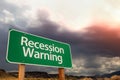 Recession Warning Green Road Sign Over Dramatic Clouds and Sky Royalty Free Stock Photo