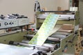RECHITSA, BELARUS - April 12, 2013: Polygraphic machine for the production of trade stickers. Royalty Free Stock Photo