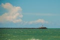 RECIFE, PERNAMBUCO, BRAZIL: Lighthouse on the horizon. Beautiful landscape with views of the rocks and turquoise sea Royalty Free Stock Photo