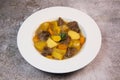 Recipe for beer and mustard beef chuck stew with potatoes, turnips and carrots