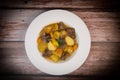 Recipe for beer and mustard beef chuck stew with potatoes, turnips and carrots