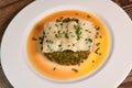 RECIPE FOR CHARD, TOMATO, ONION AND LEMON FONDUE WITH COD FILLET AND CHIVES Royalty Free Stock Photo