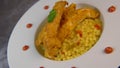 Recipe for chicken tenders with corn flakes and Italian Piombo pasta risotto and peppers