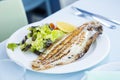 Grilled sole. Grilled fish in a restaurant on the Spanish coast. Royalty Free Stock Photo