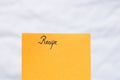 Recipe handwriting text close up isolated on orange paper with copy space