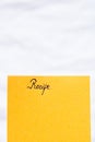 Recipe handwriting text close up isolated on orange paper with copy space