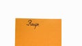 Recipe handwriting text close up isolated on orange paper with copy space