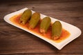 RECIPE FOR LEBANESE-STYLE MINI ZUCCHINI STUFFED WITH RICE AND BEEF IN A TOMATO SAUCE Royalty Free Stock Photo