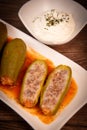 RECIPE FOR LEBANESE-STYLE MINI ZUCCHINI STUFFED WITH RICE AND BEEF IN A TOMATO SAUCE Royalty Free Stock Photo