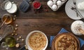 Recipe for making thin pancakes for Shrovetide or for breakfast, top view on wooden table with ingredients for making Russian panc Royalty Free Stock Photo