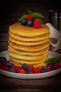 Recipe for maple syrup pancakes with raspberry and blueberry filling