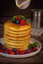 Recipe for maple syrup pancakes with raspberry and blueberry filling