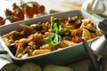 Pasta alla norma. Made with maccheroni, eggplant, tomatoes, fresh basil and grated ricotta salata. Royalty Free Stock Photo