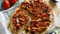Pizza with roasted eggplant and tortilla sauce. Traditional Neapolitan pizza recipe.