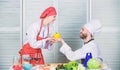 Recipe requires a lot of loving. Dieting and vitamin. culinary cuisine. man and woman chef in restaurant. Family cooking Royalty Free Stock Photo