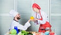 Recipe requires a lot of loving. Dieting and vitamin. culinary cuisine. man and woman chef in restaurant. Family cooking Royalty Free Stock Photo