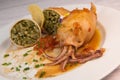 RECIPE FOR STUFFED SQUID, RIZOTTO AND SPINACH PESTO, HOMEMADE TOMATO SAUCE Royalty Free Stock Photo